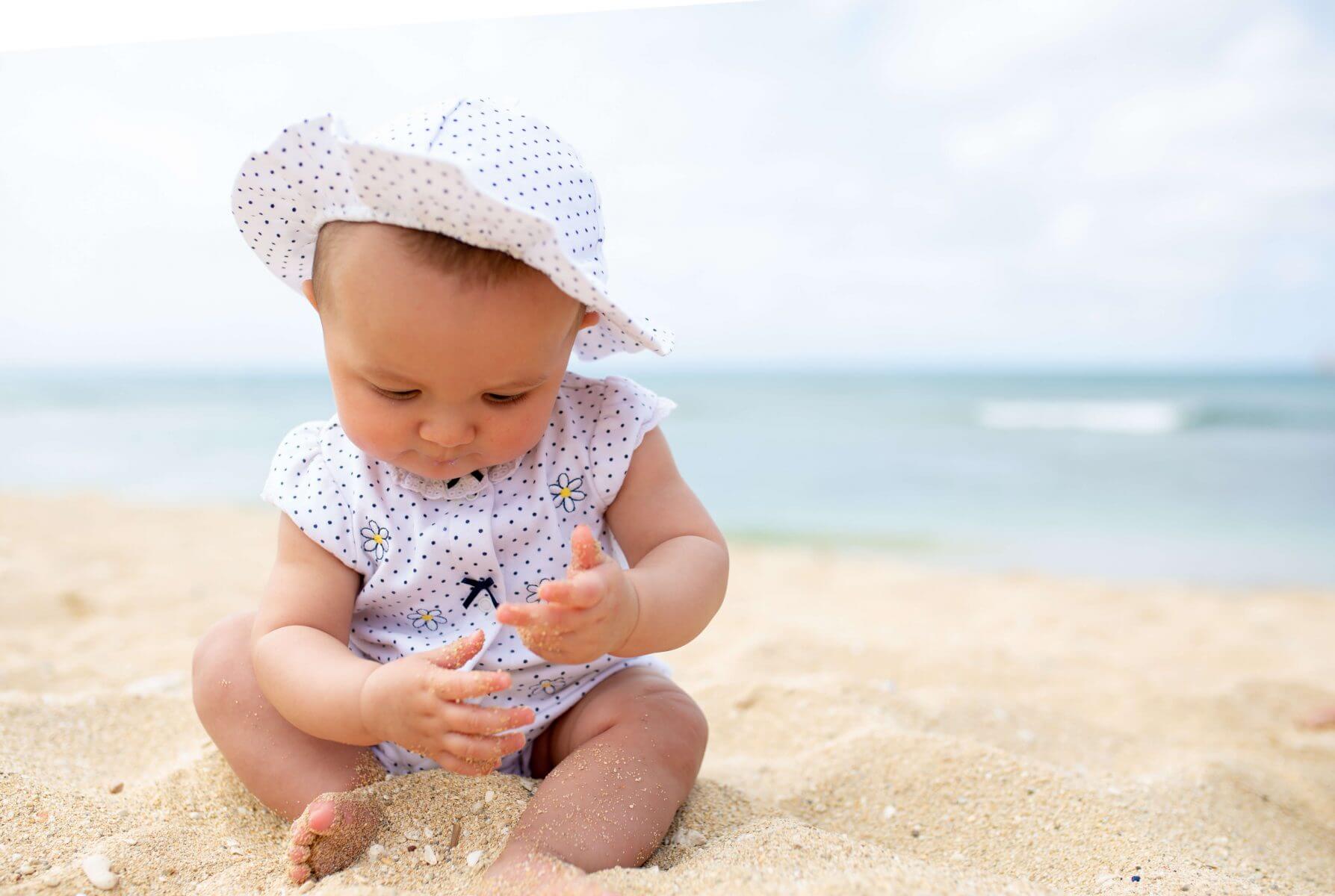 6 Months Old and Already Trying to Build Sand Castles