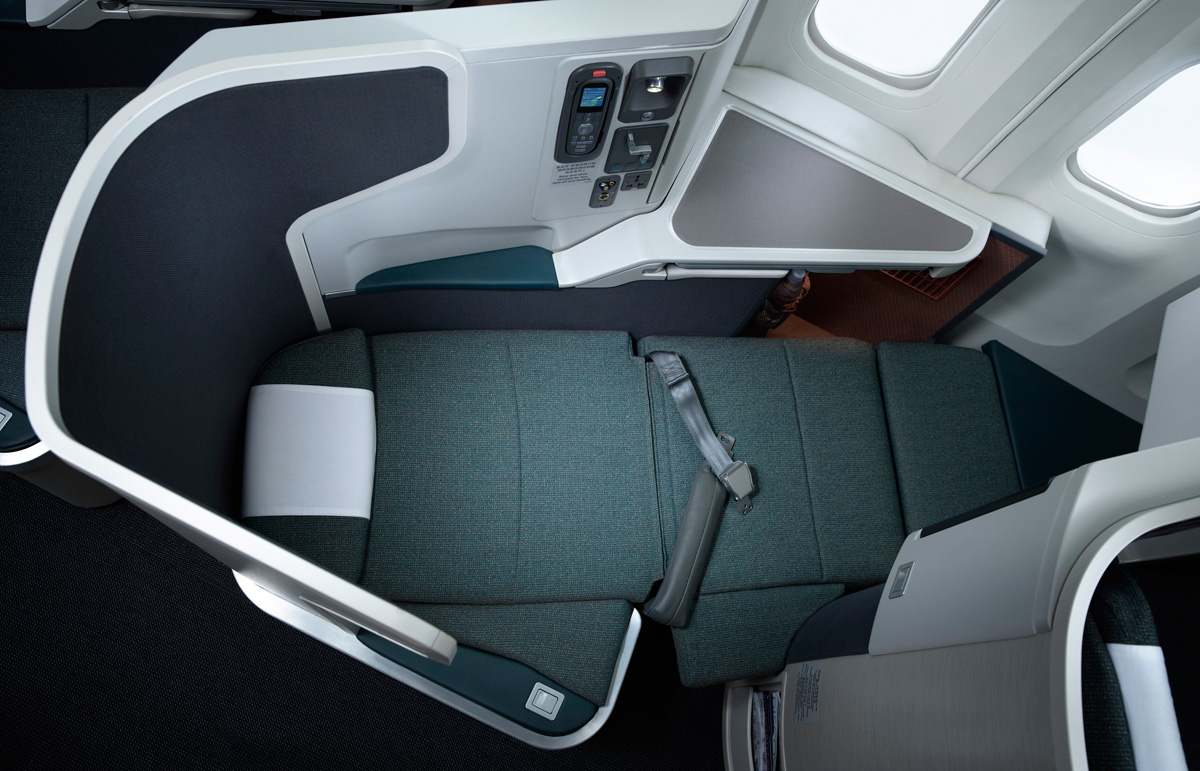 Cathay Pacific Business Class Seat that folds out to a bed. Get this with the Citi American Airlines Business Credit Card