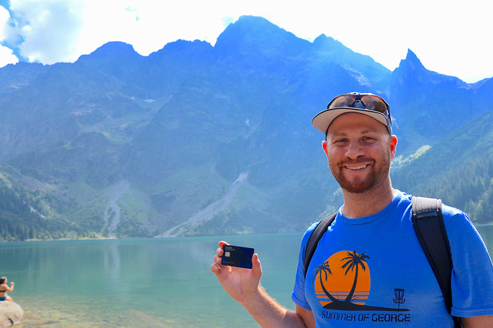 The best travel credit card for beginners is Chase Sapphire Preferred. Here I am in the mountains of Poland holding the credit card