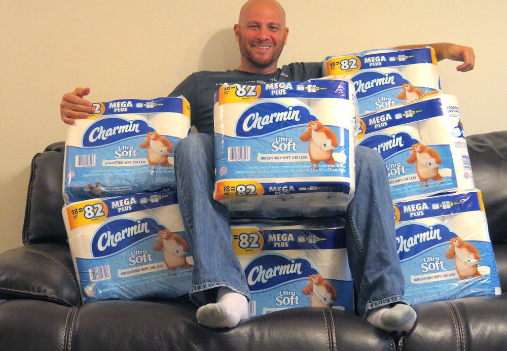 Here I am surrounded by 100s of rolls of Charmin Ultra toilet paper because there was a deal on it