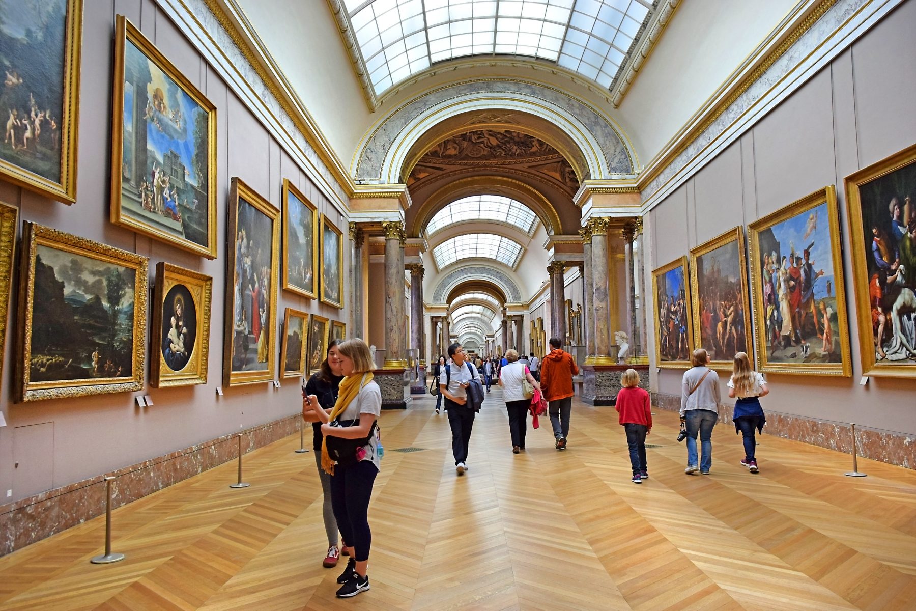 Visitors of Louvre Museum