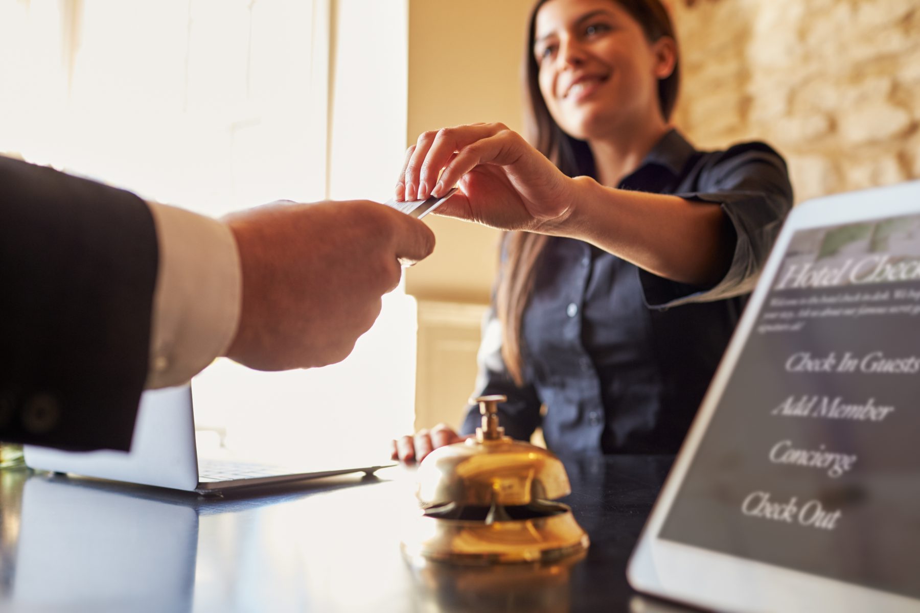 Customer checking out at hotel desk