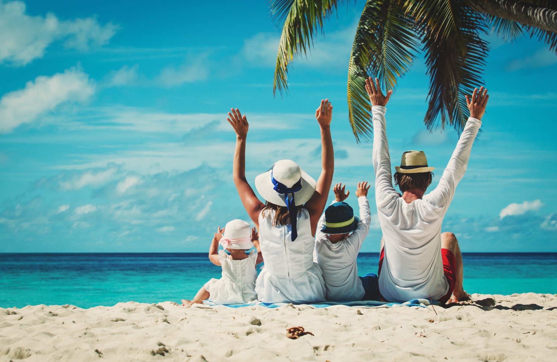 Family relaxing on a beach vacation