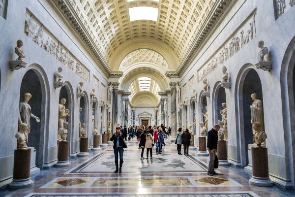 Visitors exploring halls of Vatican Museums